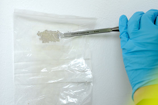 Sampling asbestos in a wall